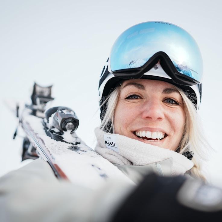 Kaveri Mehta, Lead Design Curator at SilverstoneHollow, reviewing corporate floral arrangements